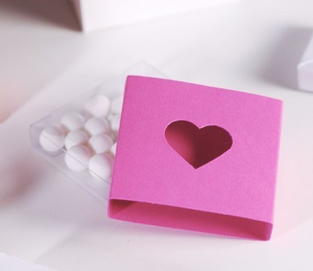 Romantic pink gift box with a cut-out heart