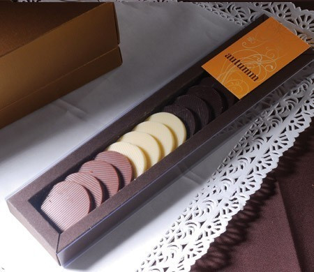 Boîte avec couverture coulissante pour des bonbons Boîte avec couverture coulissante pour des bonbons