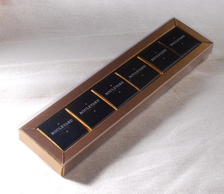 Box with transparent strip