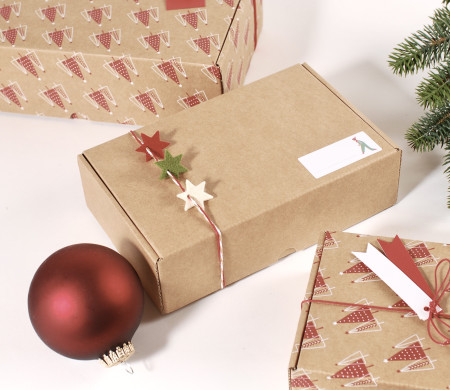 Cardboard shipping box with Christmas touches