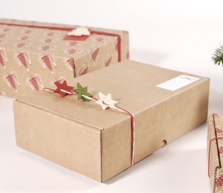 Cardboard shipping box with Christmas touches