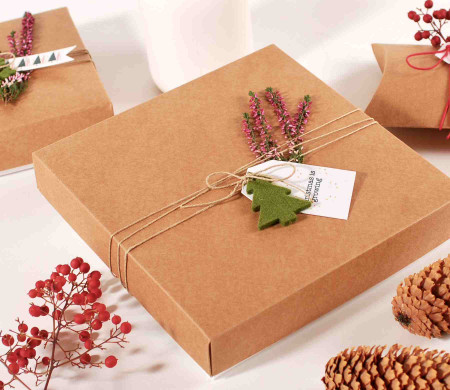 Flat cardboard gift box with Christmas decorations Flat cardboard gift box with Christmas decorations