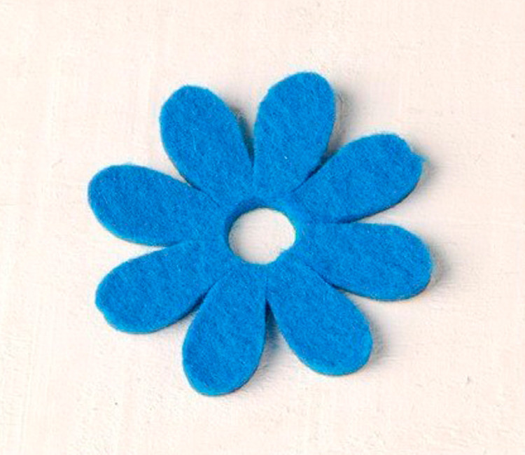 Gänseblümchen aus Filz zum Dekorieren von originellen Geschenken Gänseblümchen aus Filz zum Dekorieren von originellen Geschenken