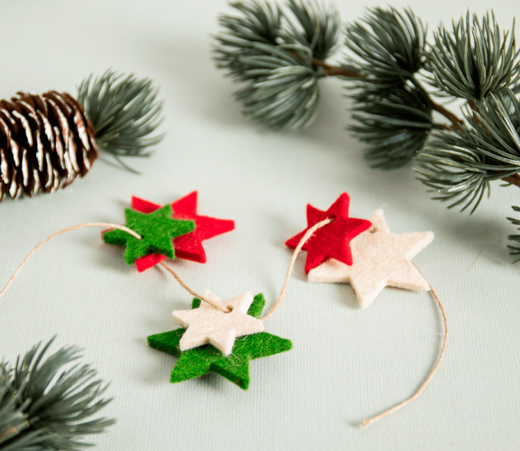 Stelle decorative in feltro da appendere Stelle decorative in feltro da appendere