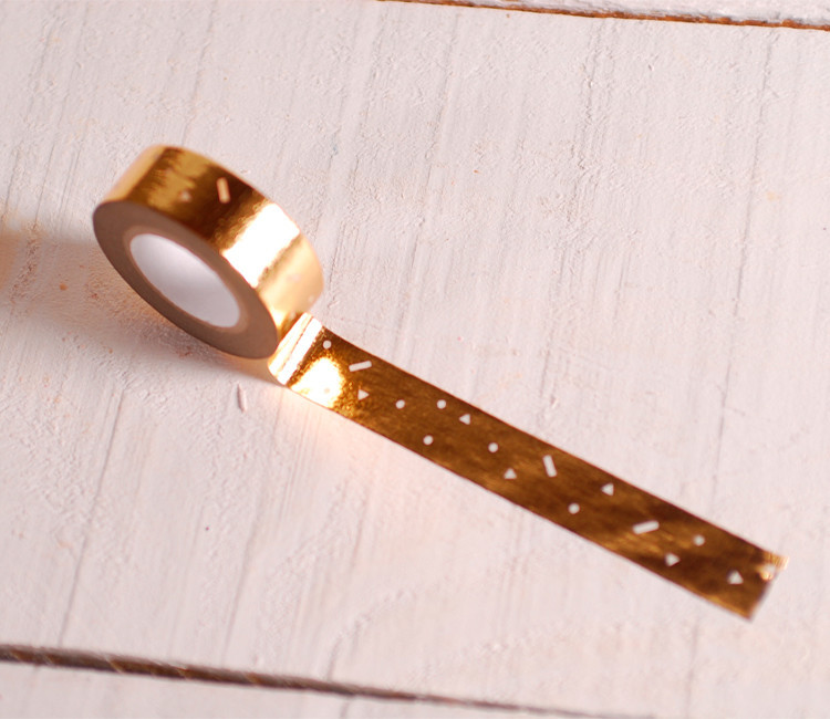 Washi tape dorado con estampado geométrico