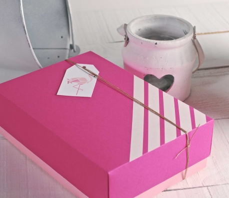 Box with printed label of a flamingo
