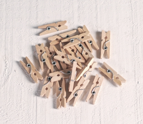 Mini wooden clothes pegs