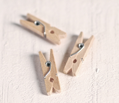 Mini wooden clothes pegs