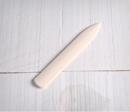 Folding stick for scrapbooking