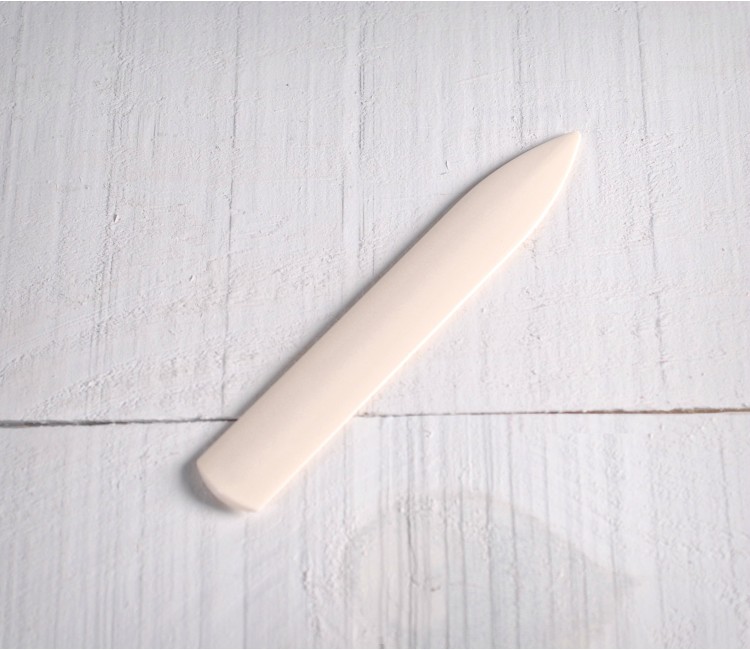 Folding stick for scrapbooking
