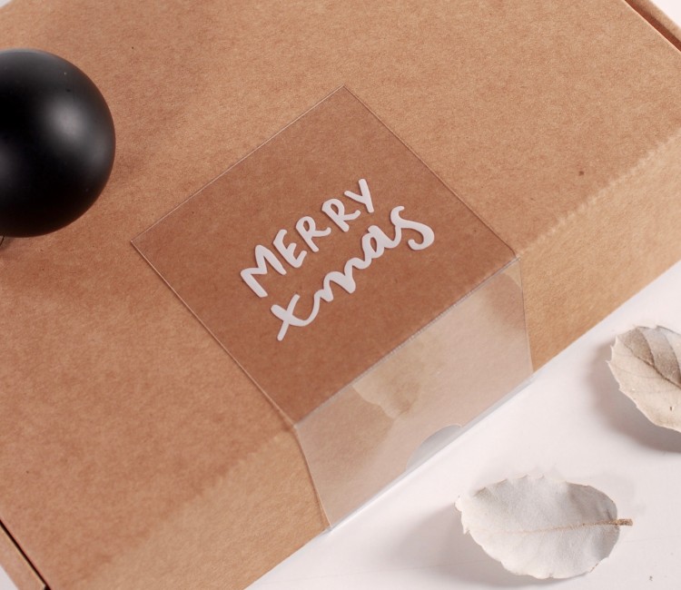 Étiquette adhésive de noël transparente | SelfPackaging