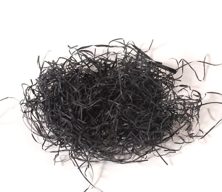 Papierschnipsel als Füllung von Kartons Papierschnipsel als Füllung von Kartons